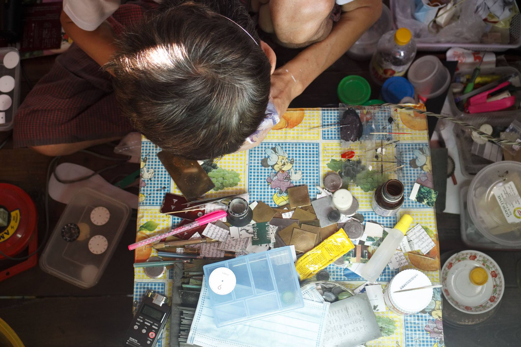 Ko Lu Maw's work station. Photo: Nay Paing/Coconuts Media.