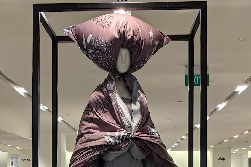 Today’s weird viral tweet goes to a mannequin that decided that today was the day to wear a pillow over her head. (Photo: @YuChengQ / Twitter)