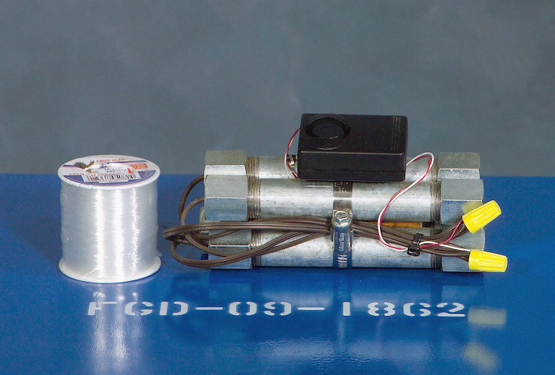 This trip wire pipe bomb improvised explosive device (IED) simulator is used to train US military service personnel (Photo: Wikipedia via DOD Defense Visual Information Center)