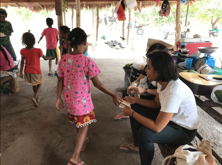 The kids' handwritten letters being given to tour guide Andrea Legaspi. Photo: Kaka Corral