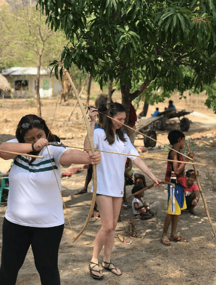 A guest tries archery at the village. Photo: Kaka Corral