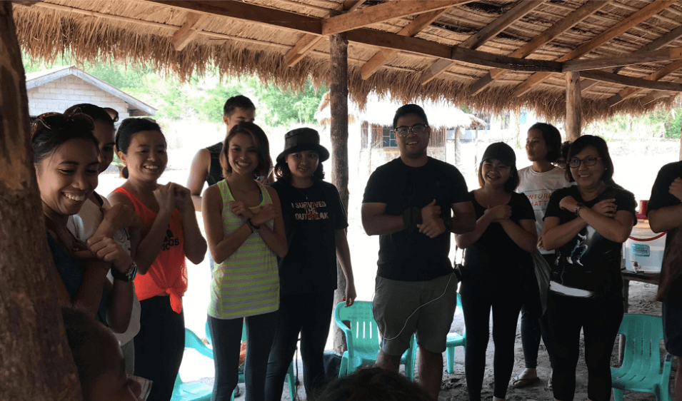 The Aeta kids teaching visitors a local dance. Photo: Jia Mercado