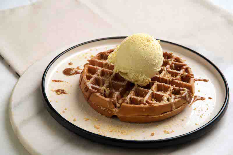 Buttermilk waffles with hazelnut praline. Photo: Strangers' Reunion