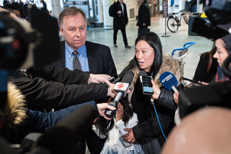 Vanessa Rodel and her daughter, Keana, face the press after being granted asylum in Canada. Keana’s father and another refugee are now asking Canada to give them asylum as well, claiming persecution in Hong Kong. Photo via AFP.
