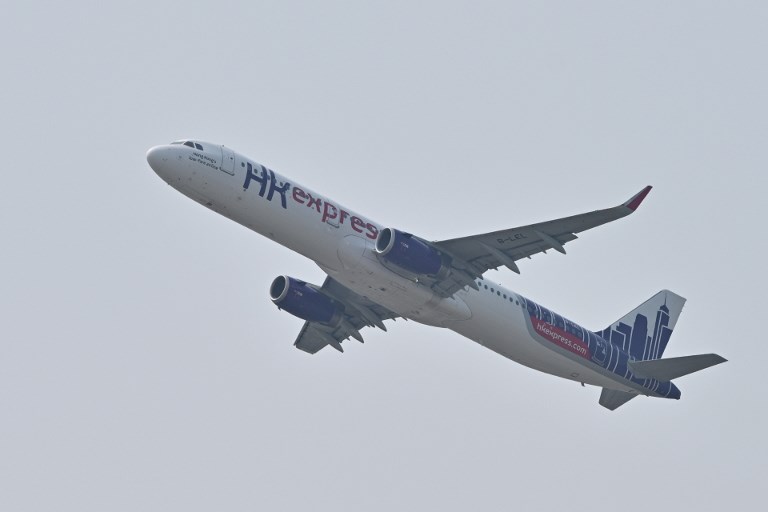 An HK Express passenger plane takes off from Hong Kong International Airport earlier this month. Photo via AFP.
