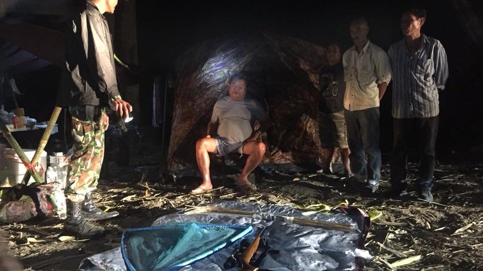 Premchai Karnasuta (center) was arrested for hunting protected animals on Sunday. Photo: Kon Anurak