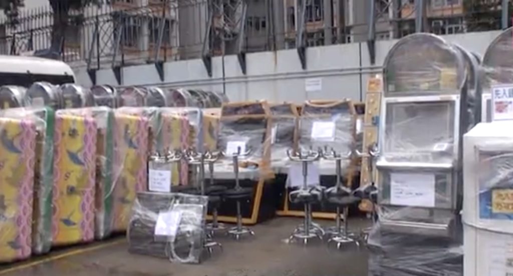 Some of the gaming machines that were seized as part of operation wisebold. Screengrab via Apple Daily video.