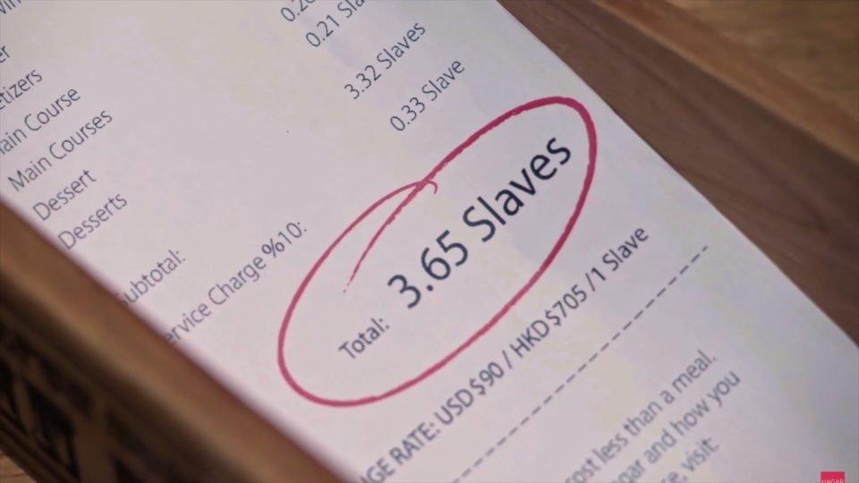 A bill showing the cost of a restaurant patron’s meal in “Slaves” rather than dollars. Screenshot via YouTube.