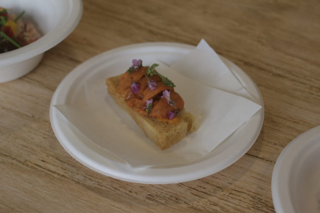 Haku's 'My Favourite Bite', uni, toasted brioche and shiso flowers. Photo by Vicky Wong.