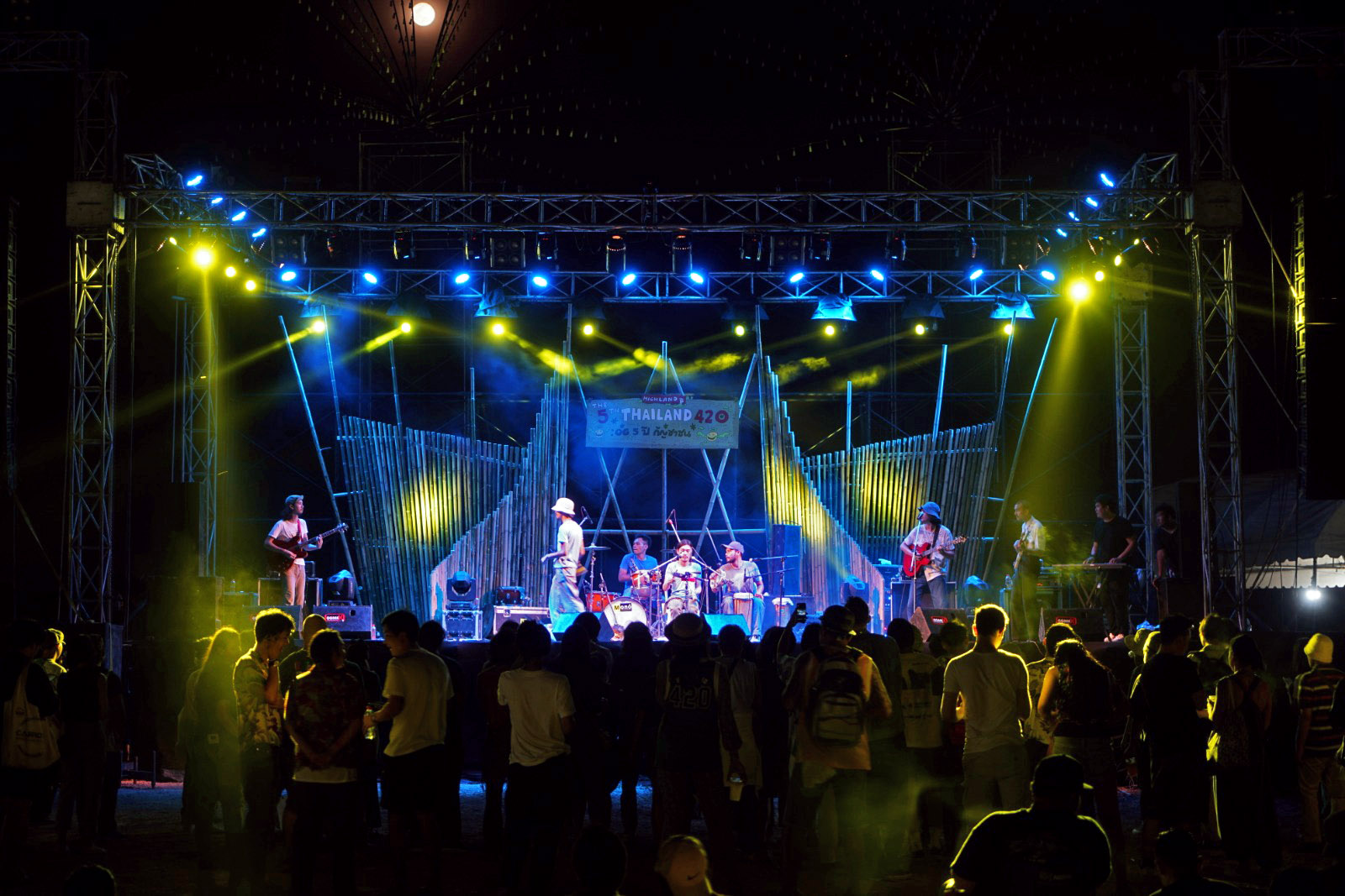 420 festival attendees enjoy an evening reggae set on the main stage. It was a full moon. 