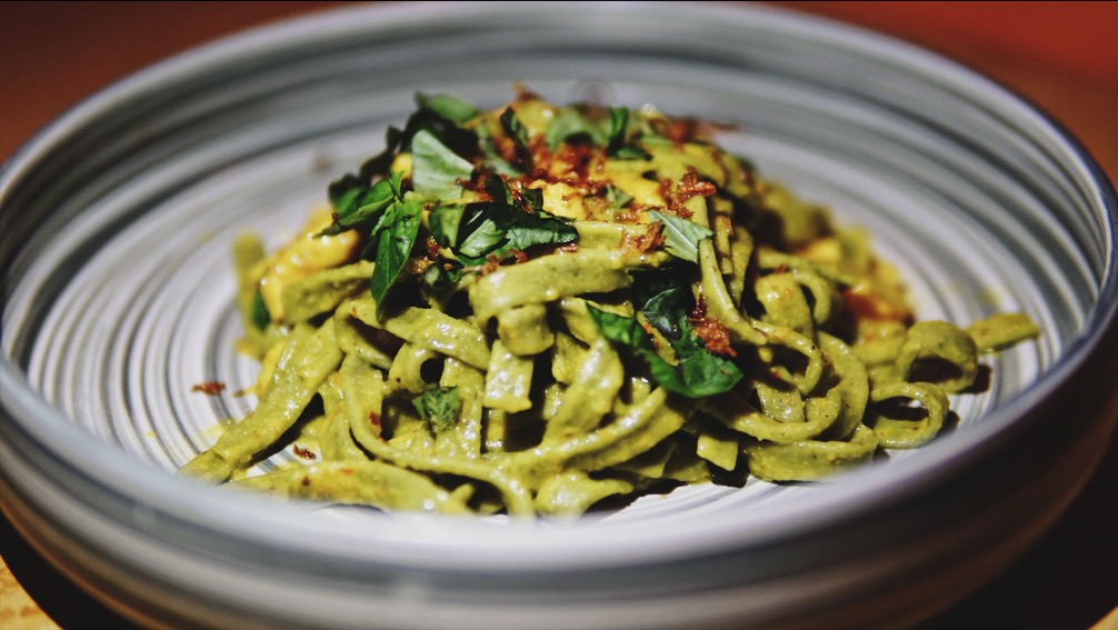 Fettuccini Be Siap Meklas: Homemade spinach fettuccini with chicken in creamy Balinese spiced sauce. Photo: Coconuts Bali