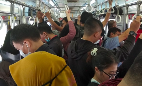 Passengers inside a KRL Commuterline on the Bekasi-Jakarta Kota line this morning. Photo: Twitter/@earnea26