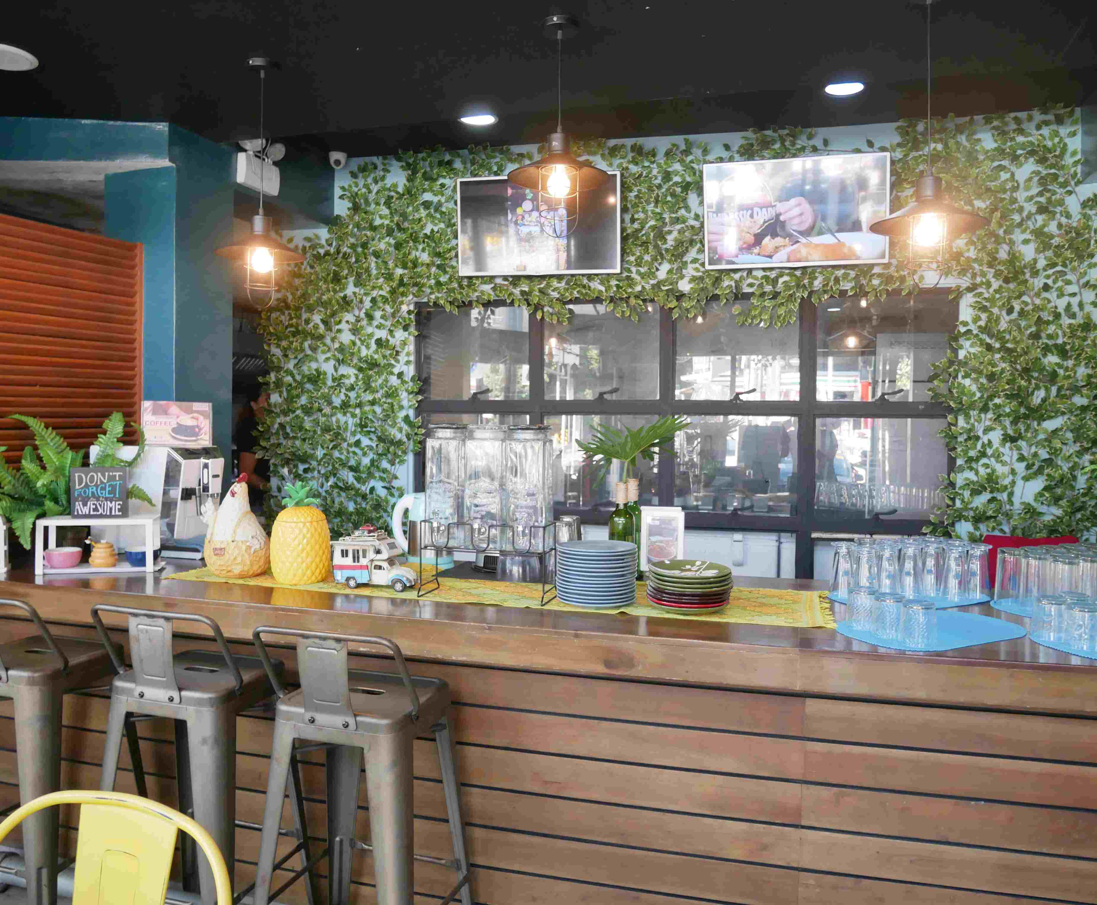 Diners can peek through these windows into the kitchen. Photo: Rachel Malaguit