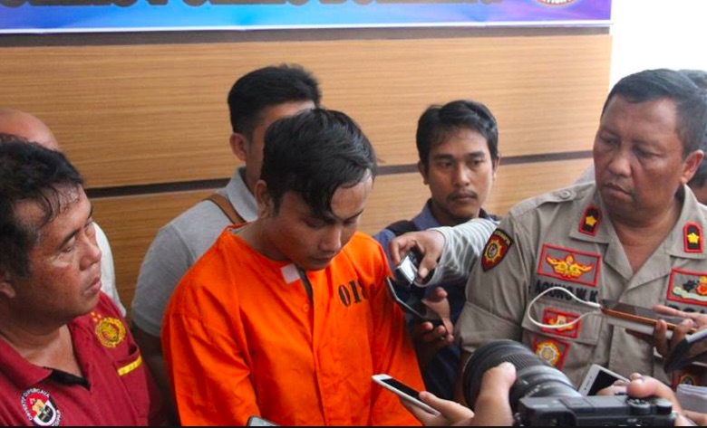 The alleged murderer, identified only his initials KI, told police he committed his crime in a fit of uncontrollable jealousy. Photo: Facebook/Bali Police Public Relations