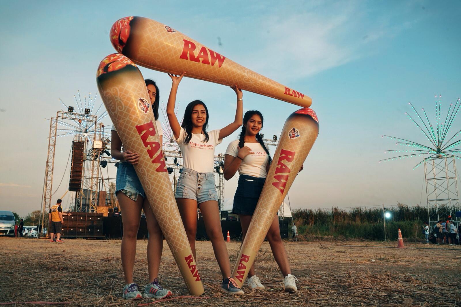 Models promote a brand of rolling papers.