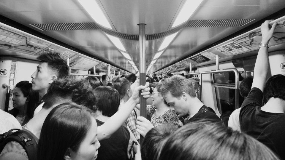 Commuters on an MTR train. Photo via Mikey Alvero.