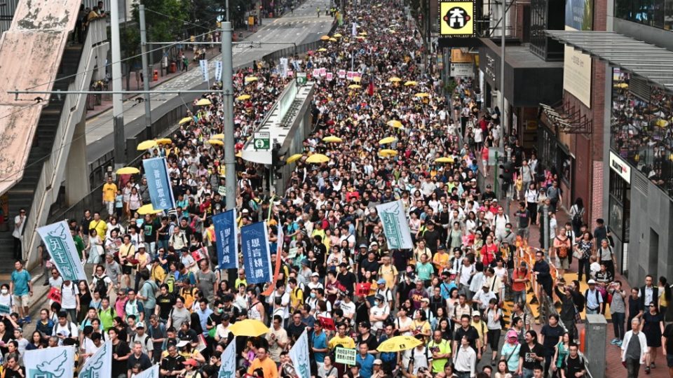 Activists protest a controversial plan by Hong Kong’s government to allow extraditions to the Chinese mainland on last month. Photo via AFP.