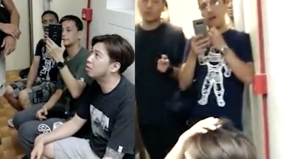 Five men were spotted waiting outside the entrance of the June 4 Museum on Saturday. Screengrab via Apple Daily video.