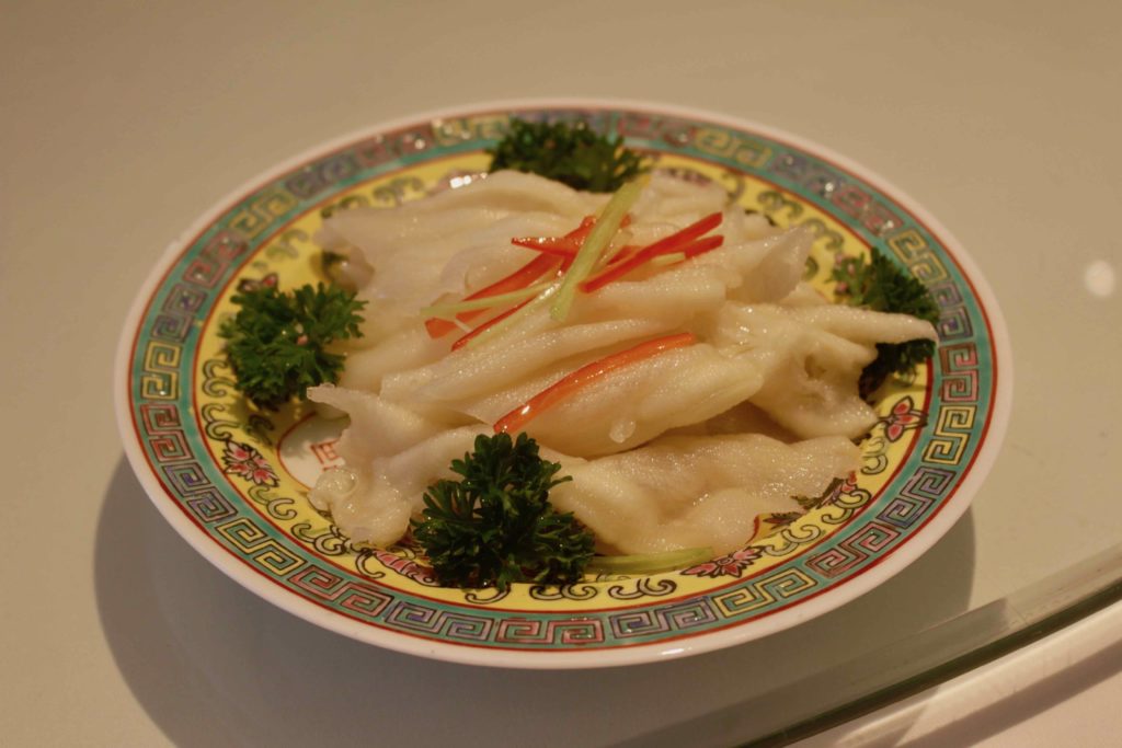 Man Hing's marinated boneless duck webs with spring onion and sesame oil. Photo by Vicky Wong.