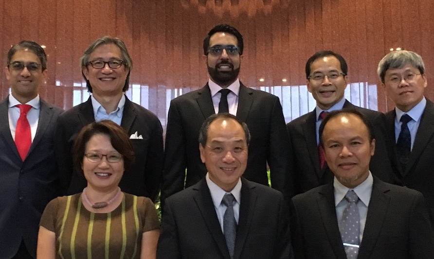 Pritam Singh (top row, middle) poses with members of The Workers’ Party (Photo: Pritam Singh / Facebook)