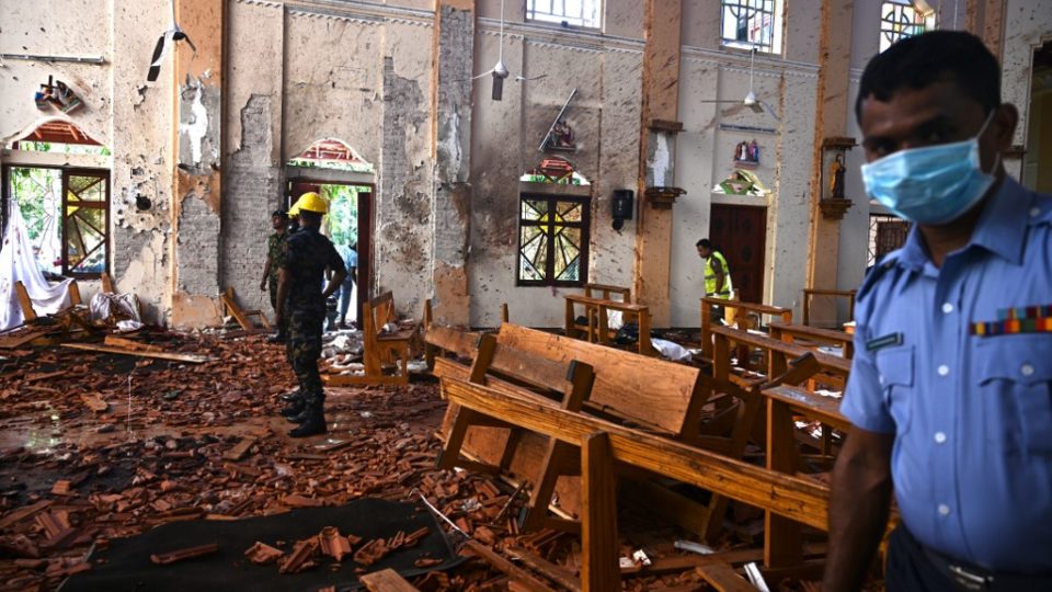 Security personnel inspect the interior of St Sebastian’s Church in Negombo on Monday, a day after the church was hit in a series of bomb blasts targeting churches and luxury hotels in Sri Lanka. Photo via AFP.