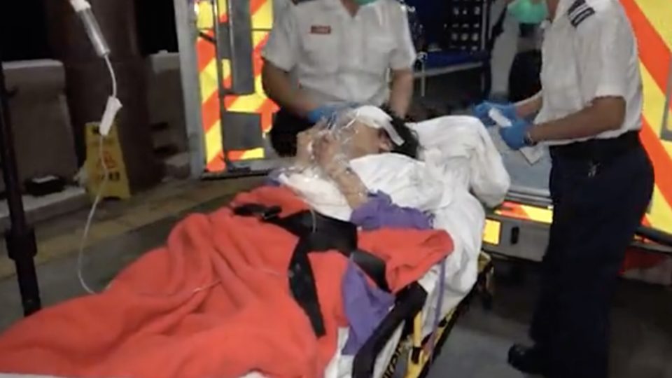 An elderly woman was taken to hospital after having her eye taken out. Screengrab via Apple Daily video.