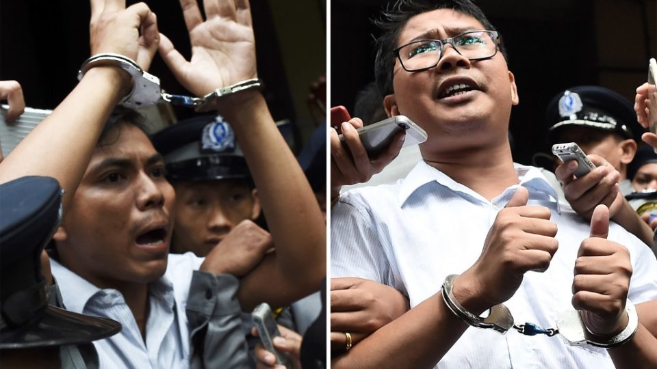 (FILES) This file combination of photos taken on September 3, 2018 shows journalists Kyaw Soe Oo (L) and Wa Lone being escorted by police after their sentencing by a court to jail in Yangon. – Myanmar’s Supreme Court on April 23, 2019 rejected an appeal by two Reuters journalists jailed for seven years on charges linked to their reporting on the Rohingya crisis, a defence lawyer confirmed. Photo by Ye Aung Thu / AFP