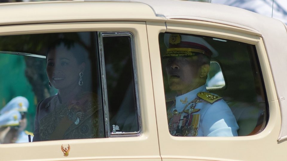 Thailand’s King Maha Vajiralongkorn (R) and Queen Suthida arrive at the Grand Palace for his coronation in Bangkok on May 4, 2019. (Photo by Jewel SAMAD / AFP)