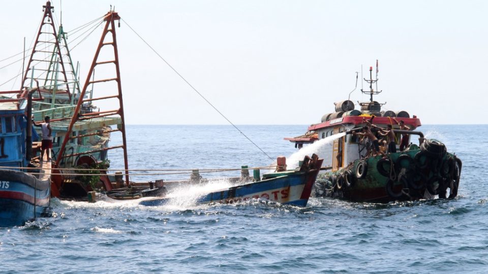 Indonesian authorities sink a Vietnamese fishing boat at Datuk island, in West Kalimantan on May 4, 2019. – Indonesia began to sink impounded foreign boats to deter illegal fishing on its water a week after a military vessel had a maritime clash with Vietnamese coastguard boats near the South China Sea. (Photo by LOUIS ANDERSON / AFP)