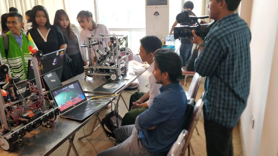 Myanmar youth robotics team presenting at the Myanmar Convention Center via First Global Team Myanmar. 