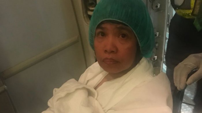 Aminah being flown back to Indonesia from Saudi Arabia. Photo: Indonesian Consulate General at Jeddah