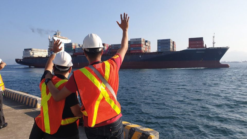 Workers wave goodbye to the MV Bavaria ship carrying the controversial Canadian garbage that had been in the Philippines for six years. Photo: @teddyboylocsin/Twitter