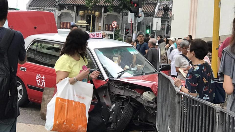 At least six people were sent to hospital after a taxi mounted a safety island and knocked them over. Photo via Facebook.