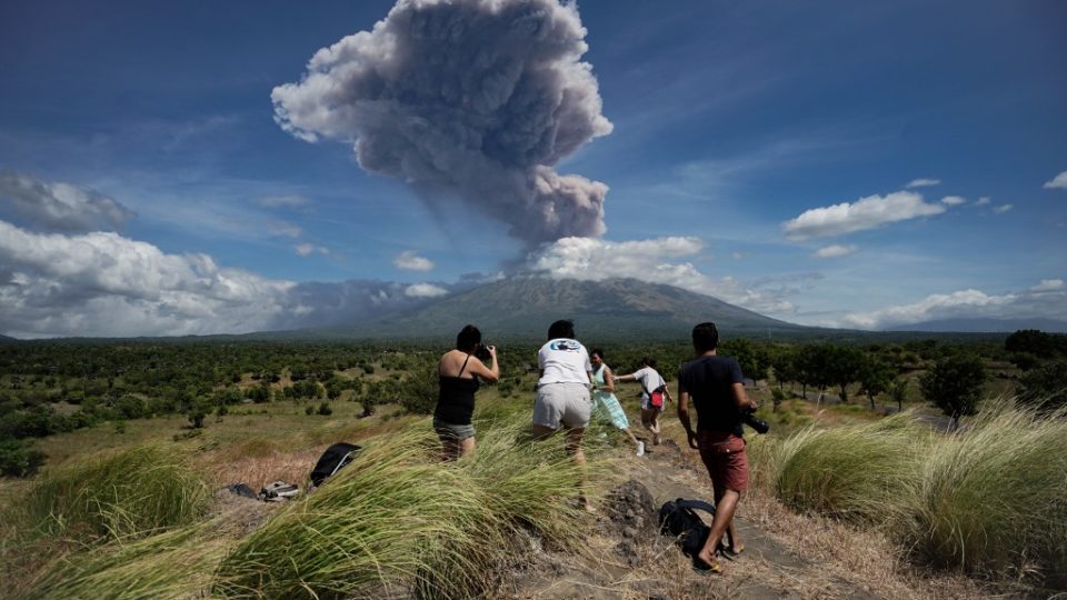 A plume of ash is released as Mount Agung volcano erupts, seen from the Kubu subdistrict in Karangasem Regency on Indonesia’s resort island of Bali on May 31, 2019. Photo: Made Alit Suantara / AFP 