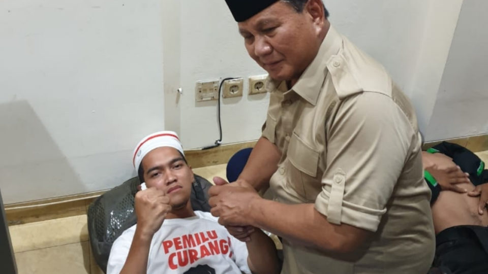 Prabowo Subianto visiting one of his supporters on Wednesday who had allegedly been injured while protesting the results of the presidential election. Photo: Dahnil Anzar Simanjuntak / Facebook
