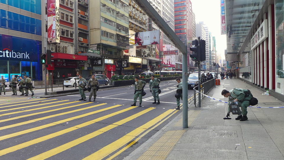 Police on standby on Nathan Road in Kowloon following the so-called “Fishball Revolution” in 2016. Photo via WikiCommons/Wpcpey