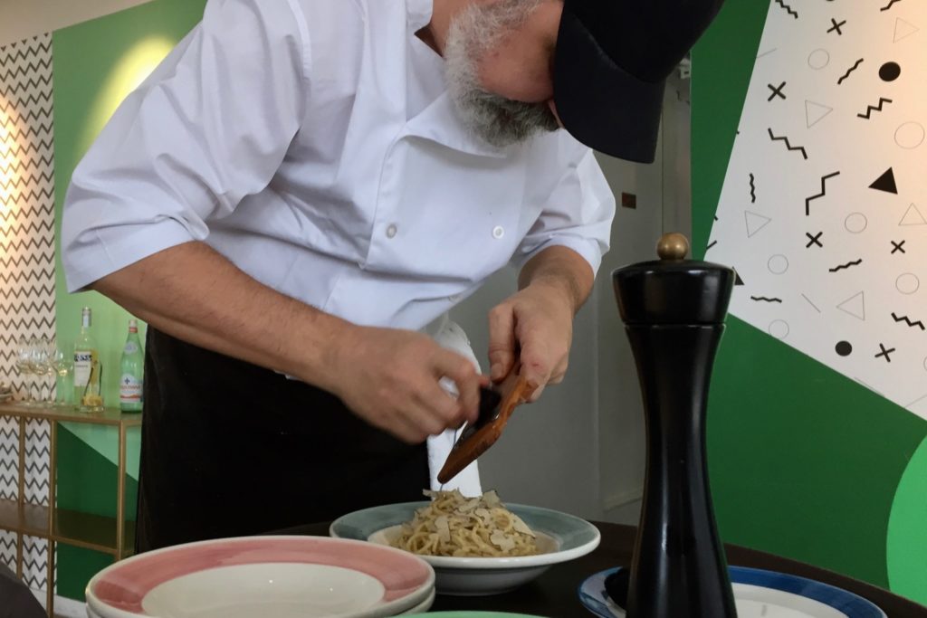 Scorzone truffle is shaved over the cacio e pepe at Papi. Photo by Stuart White.