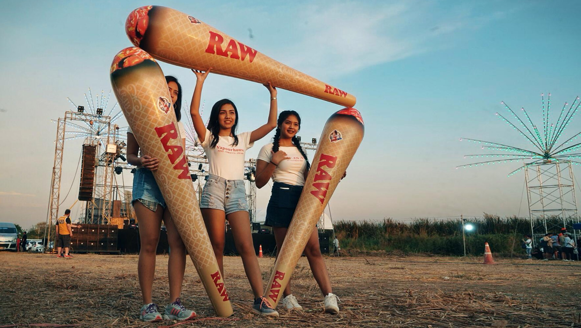 Models promote a brand of rolling papers at a marijuana festival April 20 in eastern metro Bangkok. Photo: Teirra Kamovattanavith / Coconuts Media