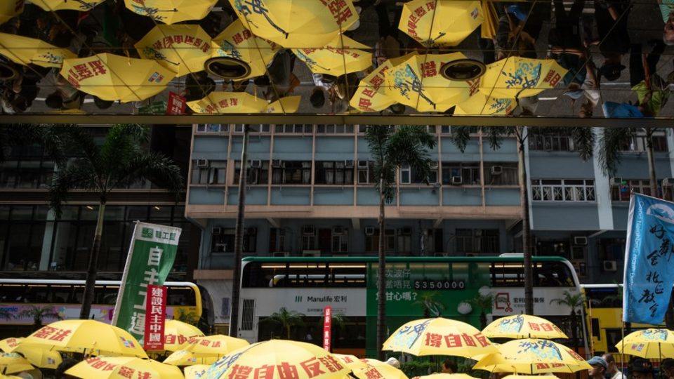 Pro-democracy activists attend a march in Hong Kong earlier this month to commemorate the June 4, 1989 Tiananmen Square crackdown in Beijing. Photo via AFP.
