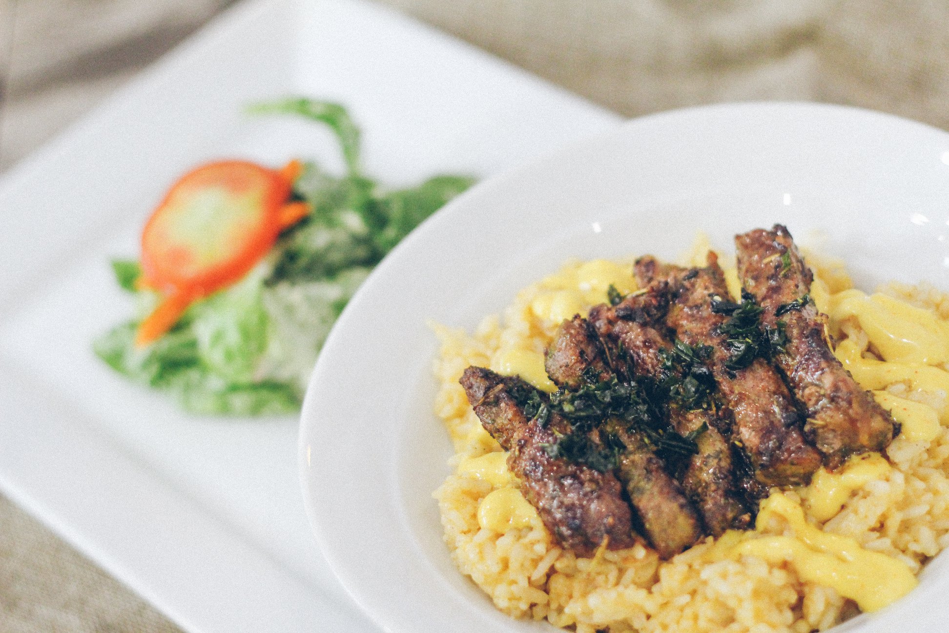 Meltique Beef over Cheesy Rice (PHP465/US.96; PHP725/US.98). Photo: Blue Rocket Cafe + Kitchen/FB