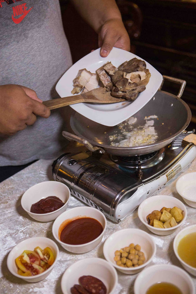 Pre-cooked meat for the puchero. (Photo: Jacques Manuntag/Coconuts) 