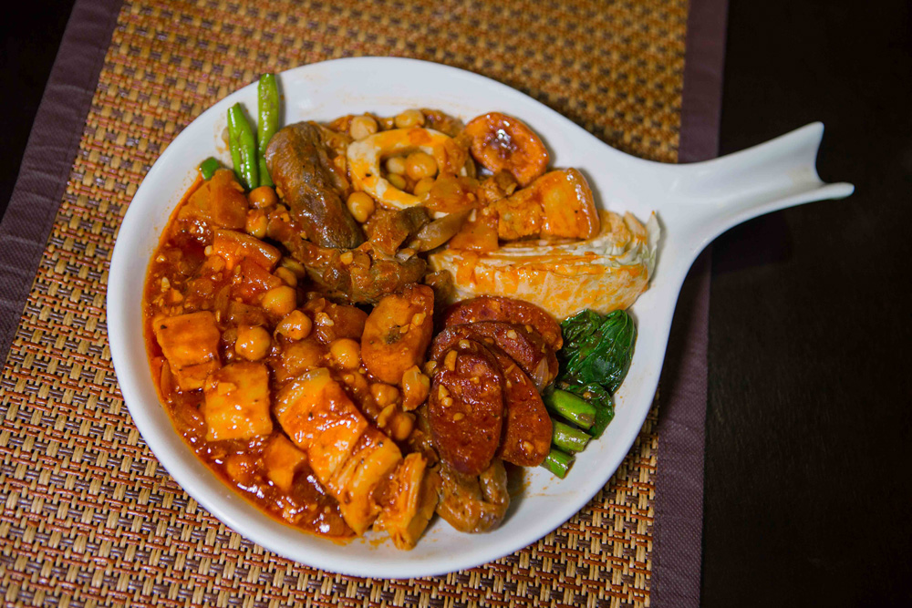 A plate of puchero. (Photo: Jacques Manuntag/Coconuts)