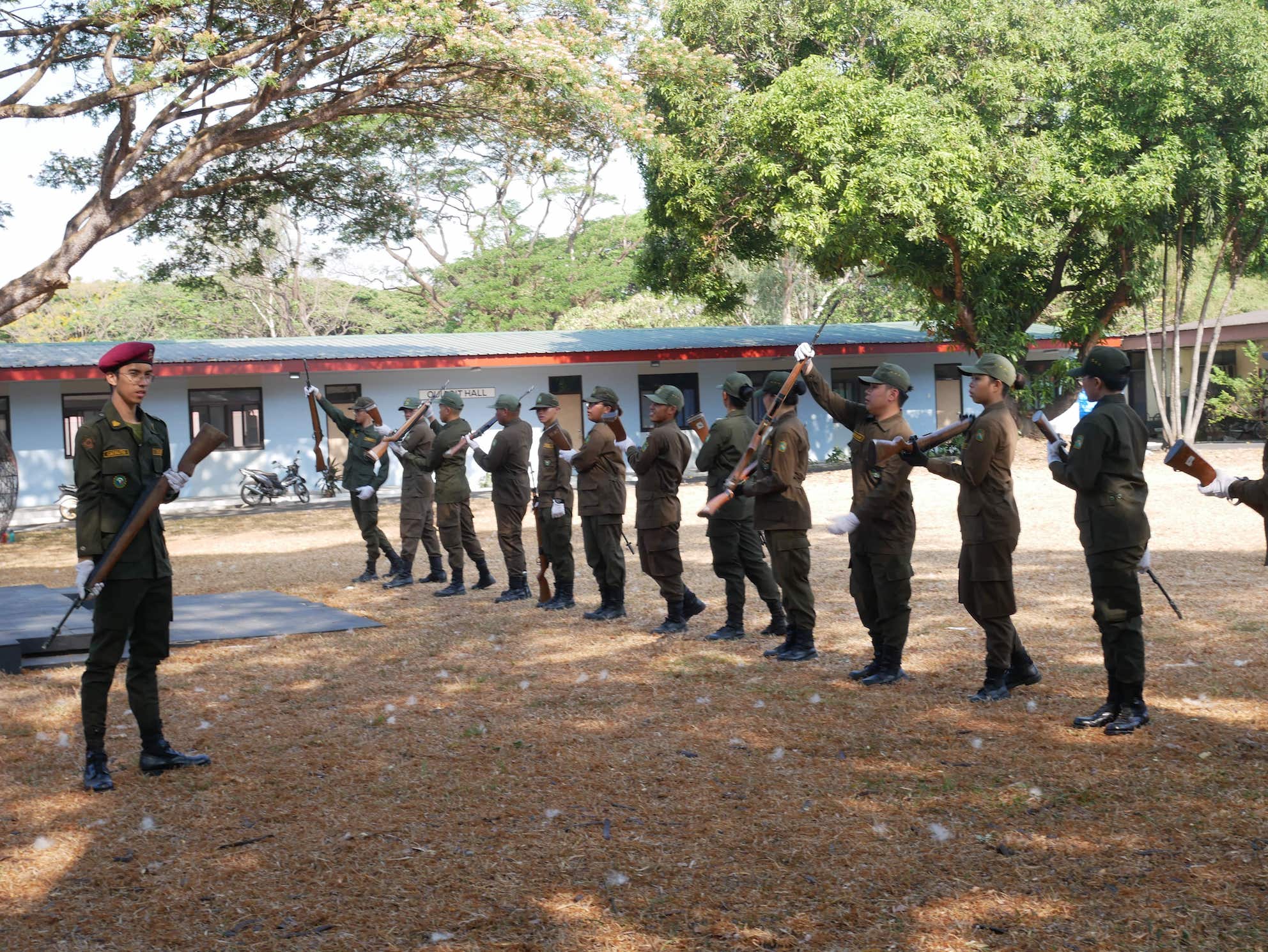 ROTC students learn rifle drills at UP Diliman. Photo: Rachel Malaguit