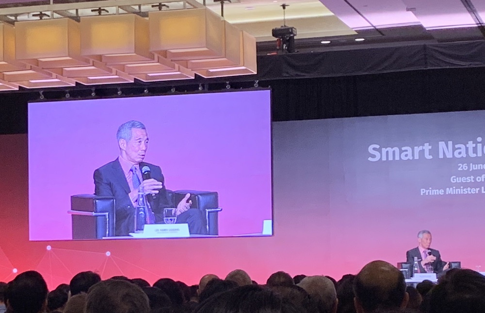 Prime Minister Lee speaking at the Smart Nation Summit. Photo: Coconuts Media