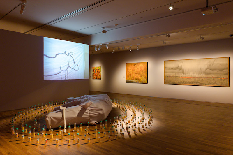 'They Poach the Rhino, Chop Off His Horn and Make This Drink' by Tang Da Wu. Staged at the National Museum Art Gallery and the Singapore Zoo in 1989, this work combines installation, performance, rituals from traditional Chinese culture, and contemporary social commentary. It refers to the Chinese myth about the rhinoceros horn's medicinal properties and how that resulted in poaching and near-extinction of the species. Photo: National Gallery Singapore