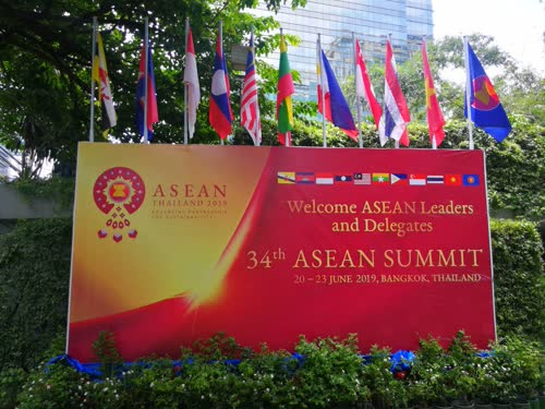 A sign welcoming delegates seen Thursday on Ratchadamri Road.