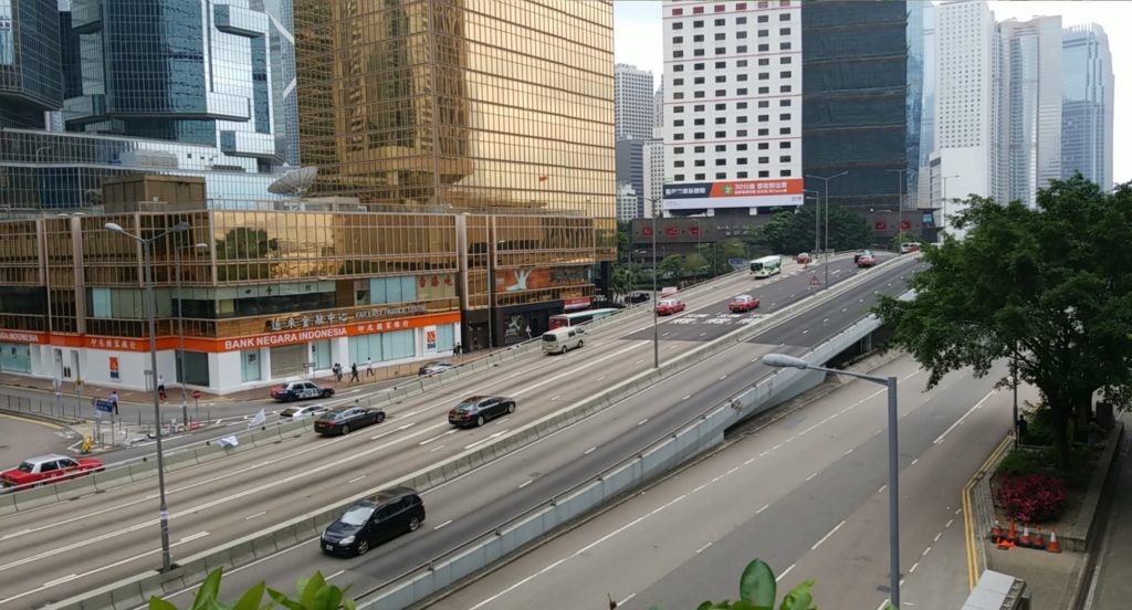 Traffic returns to Harcourt Road after the thoroughfare was blocked overnight by anti-extradition bill protesters. Photo by Vicky Wong.