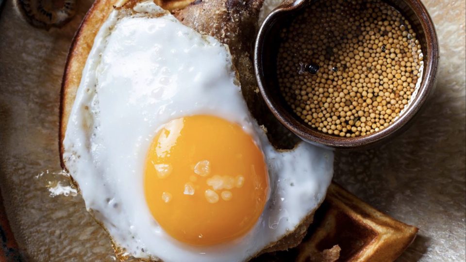Duck and Waffle’s signature dish, a fried duck and duck egg on a waffle. The London restaurant will be opening its first international outpost in Hong Kong this fall. Photo via Facebook/Duck and Waffle.