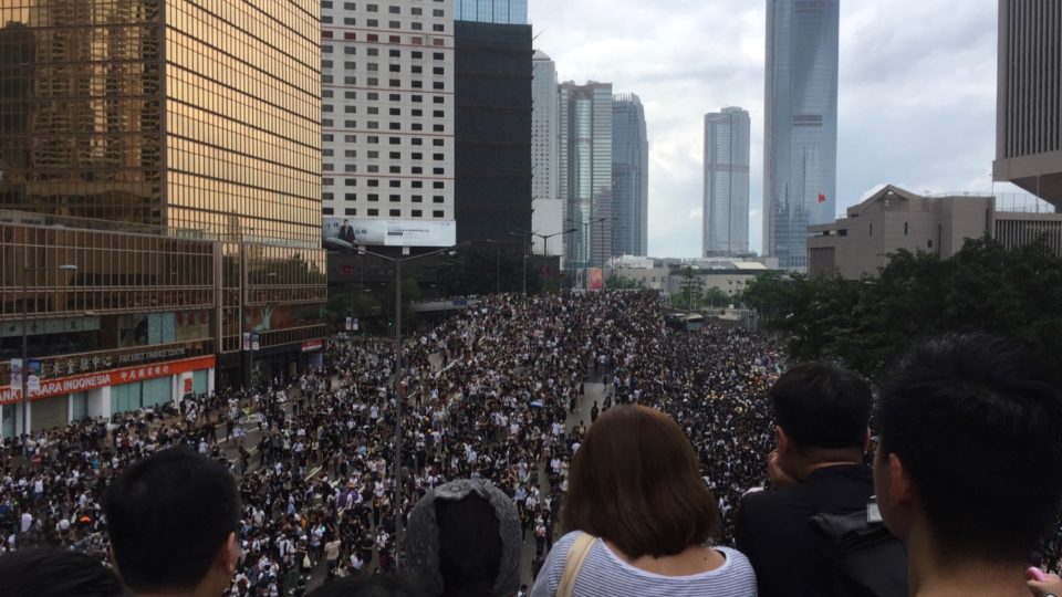 A massive crowd fills Harcourt Road in front of the LegCo on Wednesday to protest a controversial extradition bill. Photo by Stuart White.