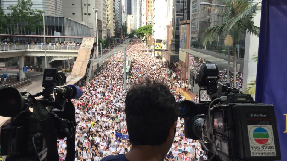 Hundreds of thousands of protesters march through Hong Kong in June to protest a controversial extradition bill. Photo by Stuart White.